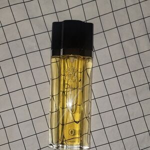 Oscar de la Renta Eau De Toilette with Black Cap and Gold Liquid